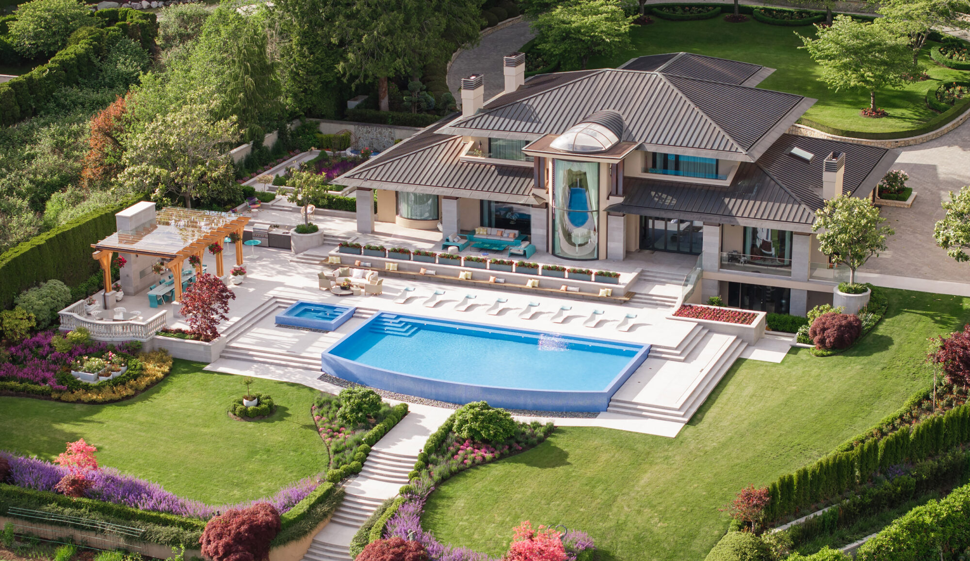 drone view of Vancouver estate with pool by Teragon