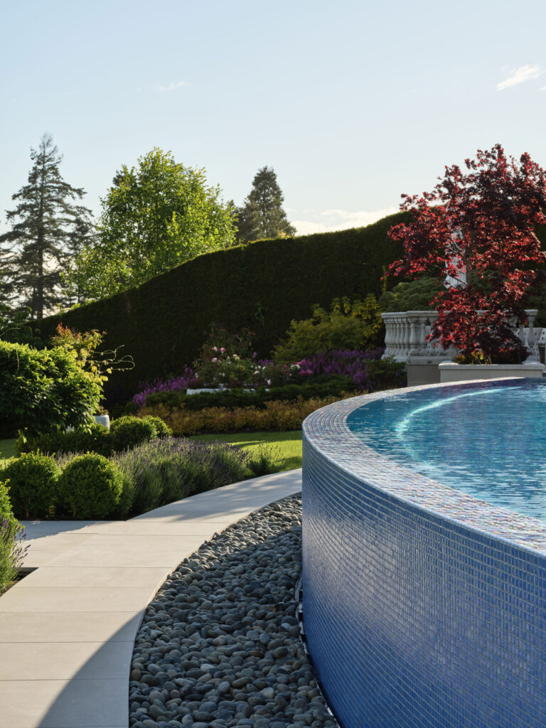 Ocean view of Vancouver estate exterior renovation with pool by Teragon