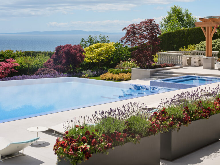 Ocean view of Vancouver estate exterior renovation with pool by Teragon