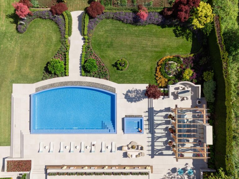 drone view of Vancouver estate with pool by Teragon